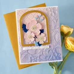 Floral Fence Of Togetherness -3D Embossing Folder Of The Month 20 Floral Fence Of Togetherness -3D Embossing Folder Of The Month -Woodland Scenics Shop 3EOM MAR25 Product 1200x1200 Project 2 87464037 977a 49c0 83ec 82755c358fc5