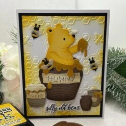 Pooh's Hunny Pot Etched Dies From The Say Cheese Classic Pooh Collection In Collaboration With Simple Stories -Woodland Scenics Shop CherylPenner2024ClassicPoohHunnyPot