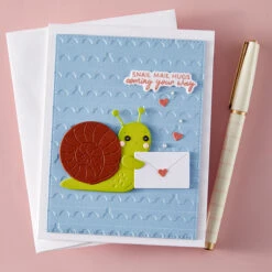 Perforated Stamp Edges -Embossing Folder Of The Month 23 Perforated Stamp Edges -Embossing Folder Of The Month -Woodland Scenics Shop EOM APR25 Product 1200x1200 Project 4 2007a8d4 03f4 4ee9 8d08 e9bb9d9ab518