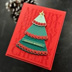 Stitched Holiday Tree Etched Dies From The Stitched Bright Collection -Woodland Scenics Shop joan bardee 2024 stitchedbright greentreeredbackground